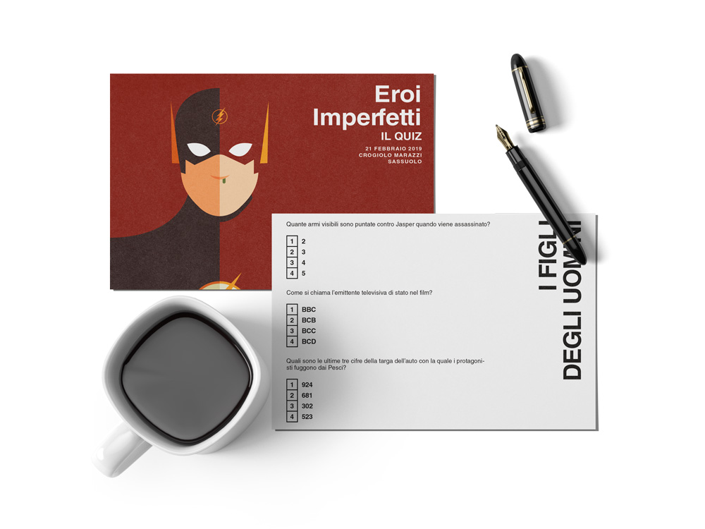 Imperfect Heroes: The Flash card front and back.
The Flash postcard front and back next to a cup of coffee and a pen. On the back of the card there is the quiz, in this case it's about the movie "Children of men". 