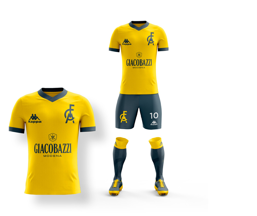 The Modena FC home jersey. The classic jersey with a yellow t-shirt and blue shorts. Blue collars, logo and details as well. 